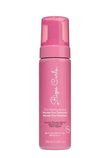 Mousse to enhance curly hair definition and hold.